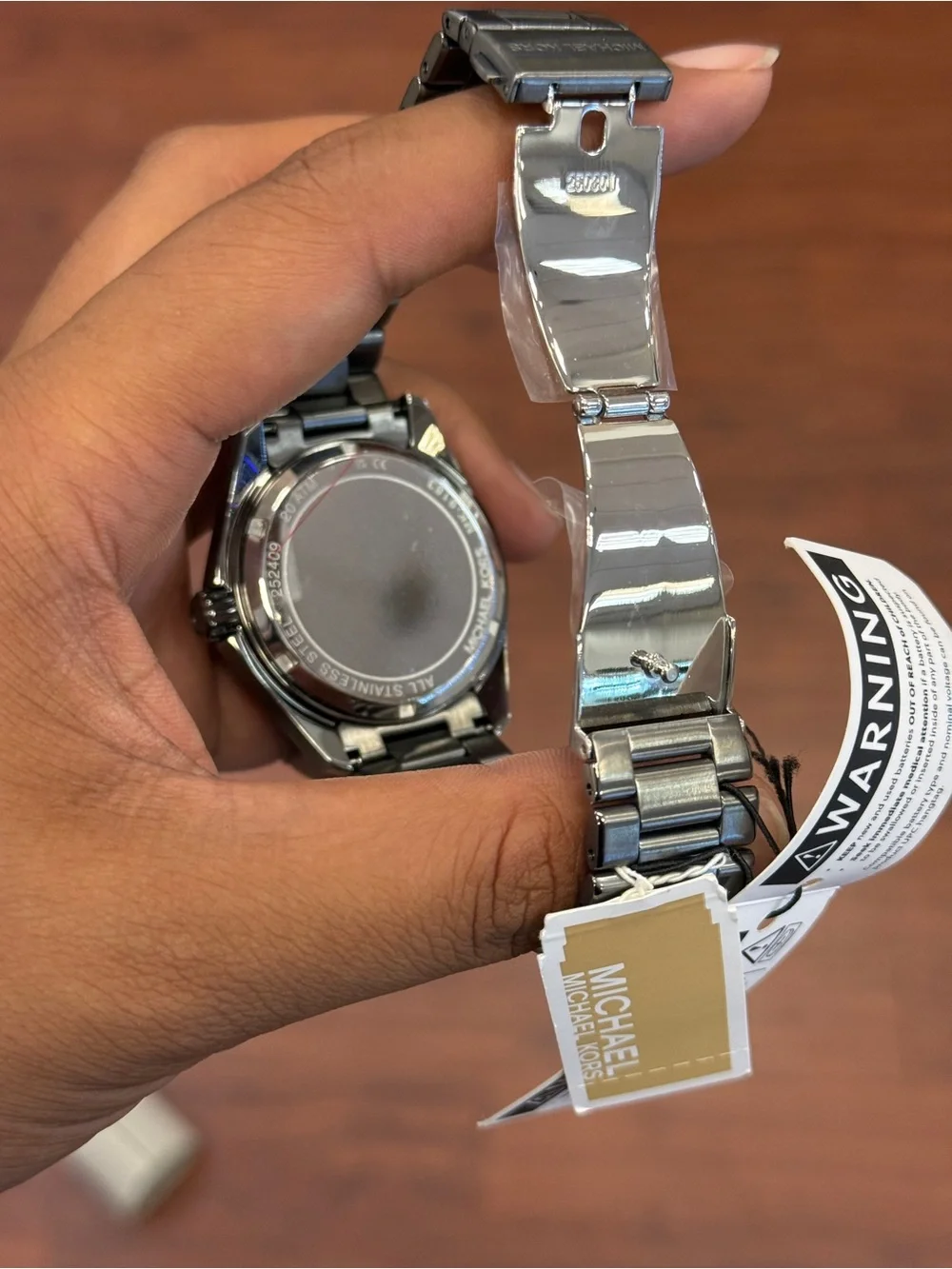 Michael Kors Silver Stainless Steel Watch with Black Bezel and White Dial men’s